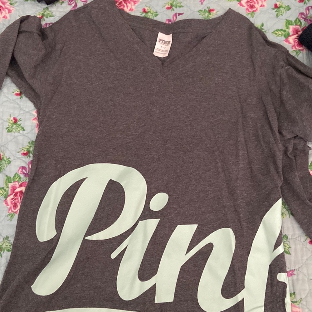 Pink long sleeve size Small  fits medium